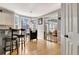 Charming kitchen and breakfast nook with a bay window and hardwood floors, perfect for enjoying morning sunlight at 155 Woodcreek Ln, Fayetteville, GA 30215