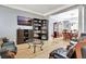 Open living space with hardwood floors, recessed lighting, and a dining area at 155 Woodcreek Ln, Fayetteville, GA 30215