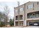 Attractive townhouse with balconies and a two-car garage at 2026 Forte Ln, Alpharetta, GA 30009