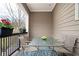Charming covered patio with a dining set, plants, and ample lighting at 2026 Forte Ln, Alpharetta, GA 30009