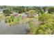 An aerial view of a house with lake access and charming landscaping at 2503 Westchester Se Way, Conyers, GA 30013