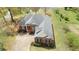 An aerial view of a beautiful brick home with a gray roof and a well-manicured lawn at 2503 Westchester Se Way, Conyers, GA 30013