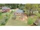 An aerial view of a home that features a private backyard and lake access at 2503 Westchester Se Way, Conyers, GA 30013