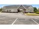Community clubhouse featuring ample parking and covered entryway at 2503 Westchester Se Way, Conyers, GA 30013
