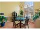 Charming dining room featuring natural light, a chandelier, and stylish décor, ideal for entertaining guests at 2503 Westchester Se Way, Conyers, GA 30013