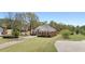 Beautiful two-story home featuring a well-manicured lawn and extended driveway at 2503 Westchester Se Way, Conyers, GA 30013