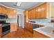 Well-equipped kitchen with wood cabinets, stainless steel appliances, and ample counter space at 2503 Westchester Se Way, Conyers, GA 30013