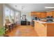 Bright kitchen with light wood cabinets, stainless steel appliances, and breakfast bar at 2503 Westchester Se Way, Conyers, GA 30013
