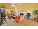 Bright and airy living room with a fireplace, office space, and lots of natural light, great for work or rest at 2503 Westchester Se Way, Conyers, GA 30013