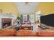 Cozy living room featuring a fireplace, comfortable seating, and natural light, ideal for Gathering gatherings at 2503 Westchester Se Way, Conyers, GA 30013