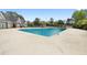 Community pool with ample space for relaxation and recreation on a sunny day at 2503 Westchester Se Way, Conyers, GA 30013