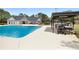 A stunning community pool with a grilling area, perfect for summer gatherings at 2503 Westchester Se Way, Conyers, GA 30013