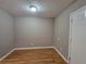 Neutral-toned bedroom featuring an overhead light and carpeted floors at 3512 Ten Oaks Ct, Powder Springs, GA 30127