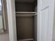 View of closet with shelf and neutral paint at 3512 Ten Oaks Ct, Powder Springs, GA 30127