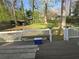 Spacious backyard views overlooking mature trees and wooden fence at 3657 Willow Wood Way, Lawrenceville, GA 30044