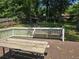 Overhead backyard shot with wooden table and benches at 3657 Willow Wood Way, Lawrenceville, GA 30044