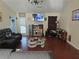 Comfortable living room features a leather couch, coffee table and wooden floors at 3657 Willow Wood Way, Lawrenceville, GA 30044