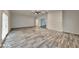 Open living area with abundant natural light and expansive wood-look flooring at 4193 Port Chester Way, Decatur, GA 30034