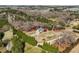 Spacious property showcasing a beautiful home surrounded by lush trees and a circular driveway at 1130 Martins Chapel Rd, Lawrenceville, GA 30045