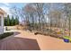 Multi-level deck in backyard with seating, swing, and landscaping at 1130 Martins Chapel Rd, Lawrenceville, GA 30045