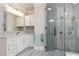 Bathroom featuring a large, glass-enclosed shower, vanity with drawers, and tile flooring at 1130 Martins Chapel Rd, Lawrenceville, GA 30045