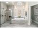 Beautiful bathroom with a soaking tub, tiled walk-in shower, and dual shower heads at 1130 Martins Chapel Rd, Lawrenceville, GA 30045