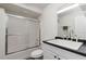 Bathroom with a shower-tub combination and a modern sink with ample counter space at 1130 Martins Chapel Rd, Lawrenceville, GA 30045