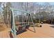 Back deck swing with view of wooded lot and pond at 1130 Martins Chapel Rd, Lawrenceville, GA 30045