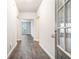 Bright foyer with hardwood floors, leading to the living spaces at 1640 Andalusian Way, Conyers, GA 30012