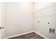 Spacious laundry room with hookups for washer and dryer and laminate floors at 1640 Andalusian Way, Conyers, GA 30012