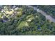 A lush landscape surrounds the property, providing ample privacy and a beautiful natural setting at 2100 West Wesley Rd, Atlanta, GA 30327