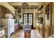 Charming kitchen with vintage appliances, exposed wood beams, and a rustic island at 2100 West Wesley Rd, Atlanta, GA 30327