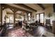 Spacious living room featuring exposed wood beams, rustic decor, and an open floor plan at 2100 West Wesley Rd, Atlanta, GA 30327