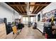 Functional basement space with exposed ceiling, work area, laundry facilities, and ample room for projects at 3174 Country Club Nw Ct, Kennesaw, GA 30144