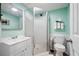 This bathroom features green paint, a shower, and a white vanity at 3174 Country Club Nw Ct, Kennesaw, GA 30144