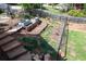 Outdoor garden space with raised garden beds and wooden staircase access to create your dream landscape at 3174 Country Club Nw Ct, Kennesaw, GA 30144