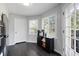 Bright kitchen has coffee bar and leads to french doors to the patio at 3174 Country Club Nw Ct, Kennesaw, GA 30144