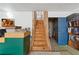 Basement stairwell with unfinished wood at 3503 Dunbar Ln, Suwanee, GA 30024