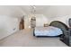 A large bedroom with a big bed and natural light at 3503 Dunbar Ln, Suwanee, GA 30024