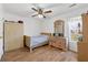 Bedroom with classic furniture and ample closet space, creating a cozy and functional area at 3503 Dunbar Ln, Suwanee, GA 30024