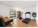 Bright bonus room with hardwood floors, lots of natural light, and a neutral color palette at 3503 Dunbar Ln, Suwanee, GA 30024
