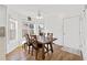Cozy dining area with ample natural light and wood table at 3503 Dunbar Ln, Suwanee, GA 30024