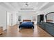 Spacious main bedroom with a tray ceiling and large windows at 3503 Dunbar Ln, Suwanee, GA 30024