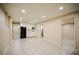 Spacious basement includes a kitchenette and access to a full bathroom at 2048 Kelvin Dr, Lawrenceville, GA 30043