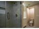 Modern bathroom features a tiled shower with glass doors and a contemporary vanity at 2048 Kelvin Dr, Lawrenceville, GA 30043