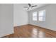 Bedroom with hardwood flooring and natural light at 2095 Highway 20 Ne, Conyers, GA 30012