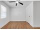 Bedroom with hardwood flooring, ceiling fan and natural light at 2095 Highway 20 Ne, Conyers, GA 30012
