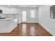 Eat-in kitchen area with access to the back of the home at 2095 Highway 20 Ne, Conyers, GA 30012
