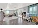 Finished basement with french doors, recessed lighting, and plank floors at 2806 Peachtree Walk, Duluth, GA 30096