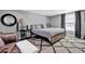 Bedroom features a ceiling fan, neutral walls, plush carpet, and a large window at 2806 Peachtree Walk, Duluth, GA 30096